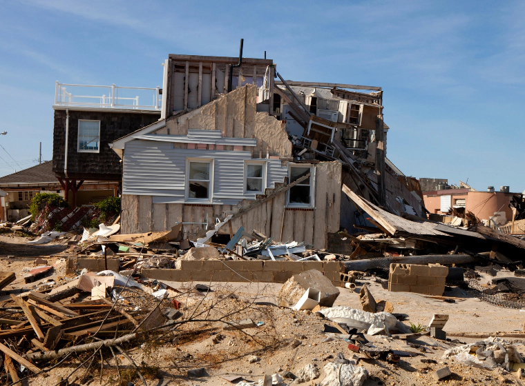the aftermath of a house that got destroyed by a natural disaster